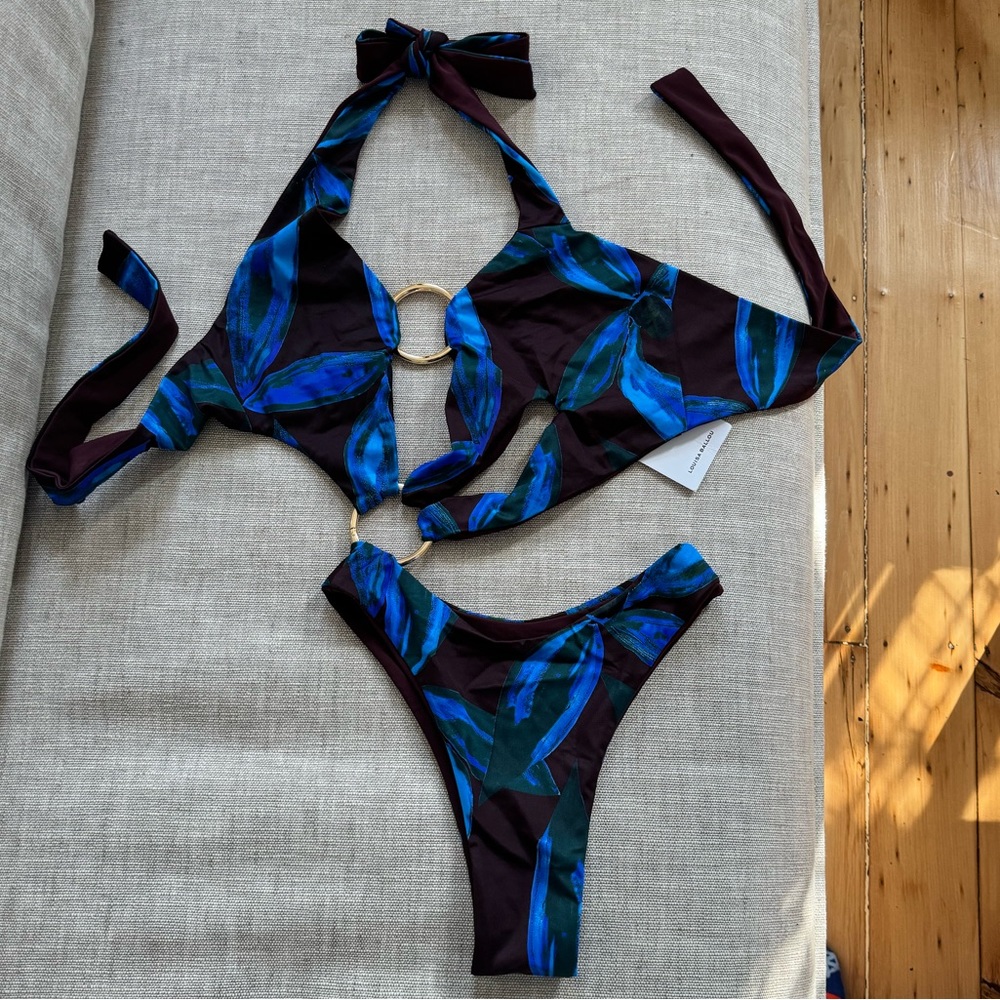 Louisa Ballou cut out one piece swimsuit. Size small.